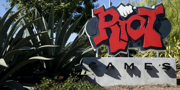 A logo sign outside of the headquarters of Riot Games, Inc., in Los Angeles, California on September 15, 2018. (Photo by Kristoffer Tripplaar/Sipa USA)